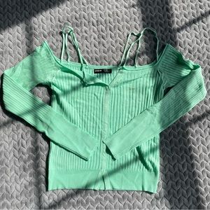 Bright green sweater